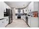 Beautiful kitchen with a stainless steel refrigerator and white cabinets at 1611 Hillside Bend Xing, Lawrenceville, GA 30043