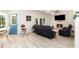 Inviting living room featuring a fireplace, TV, and comfortable seating at 1611 Hillside Bend Xing, Lawrenceville, GA 30043