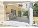 Relax on the covered patio with ample space for dining and entertainment at 1611 Hillside Bend Xing, Lawrenceville, GA 30043