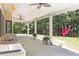 Enjoy outdoor living on this spacious patio with swing and ceiling fans at 1611 Hillside Bend Xing, Lawrenceville, GA 30043