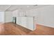 Finished basement with a white painted brick bar and wood flooring at 3332 Saint John Dr, East Point, GA 30344