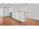Finished basement featuring a brick bar and wood flooring at 3332 Saint John Dr, East Point, GA 30344