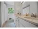 Bathroom features double sinks, a large mirror, and a clean, simple design at 3332 Saint John Dr, East Point, GA 30344