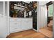 Bathroom featuring colorful wallpaper, a modern vanity, and ample storage space at 3332 Saint John Dr, East Point, GA 30344