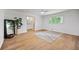 Bedroom featuring new hardwood floors and a ceiling fan at 3332 Saint John Dr, East Point, GA 30344