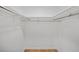 A closet with shelving and a rod for hanging clothes at 3332 Saint John Dr, East Point, GA 30344