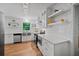 Bright kitchen with stainless appliances, white cabinets and subway tile, and a view to the outdoors at 3332 Saint John Dr, East Point, GA 30344