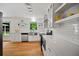 Modern kitchen with white countertops, stainless steel appliances, and open shelving at 3332 Saint John Dr, East Point, GA 30344