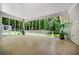 Bright sunroom with floor-to-ceiling windows, letting in plenty of natural light and showcasing the backyard at 3332 Saint John Dr, East Point, GA 30344