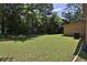 Expansive, grassy backyard with mature trees providing ample shade for outdoor enjoyment at 3429 Timbercreek Dr, Lawrenceville, GA 30044