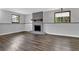 Finished basement with cozy fireplace and wood floors at 3429 Timbercreek Dr, Lawrenceville, GA 30044