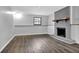 Finished basement with cozy fireplace and wood floors at 3429 Timbercreek Dr, Lawrenceville, GA 30044