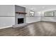 Finished basement featuring a fireplace, wood-look flooring, and ample natural light at 3429 Timbercreek Dr, Lawrenceville, GA 30044