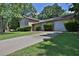 Charming home with a two-car garage, mature landscaping, and an inviting driveway at 3429 Timbercreek Dr, Lawrenceville, GA 30044