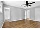 Bedroom features a ceiling fan and connecting bathroom at 3429 Timbercreek Dr, Lawrenceville, GA 30044