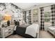 Beautiful bedroom with floral wallpaper, modern furniture, and black and white curtains at 84 Ravencliff Dr # 84, Austell, GA 30168