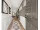 Inviting hallway with modern decor, hardwood floors, and neutral paint scheme at 84 Ravencliff Dr # 84, Austell, GA 30168