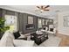 Bright living room with fireplace, comfortable seating, and abundant natural light at 84 Ravencliff Dr # 84, Austell, GA 30168