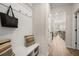 Convenient mud room with storage bench, hooks, and stylish decor accents at 84 Ravencliff Dr # 84, Austell, GA 30168