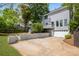 View of the backyard of this home with a great garage and parking pad at 907 Edgewood Ave Ne, Atlanta, GA 30307