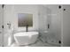 Bathroom features a modern tub, walk-in shower with black hardware at 907 Edgewood Ave Ne, Atlanta, GA 30307