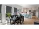 Dining area with a view into the kitchen and stainless steel appliances at 907 Edgewood Ave Ne, Atlanta, GA 30307