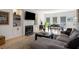 Bright living room with hardwood floors, fireplace, and comfortable seating area at 907 Edgewood Ave Ne, Atlanta, GA 30307