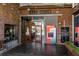 Exterior view of the Krogg Street Market entrance, featuring brick facade and modern architectural elements at 907 Edgewood Ave Ne, Atlanta, GA 30307