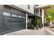 Stylish restaurant exterior featuring Bread & Butterfly signage, black trim, and potted plants along the entrance at 907 Edgewood Ave Ne, Atlanta, GA 30307
