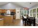 Bright kitchen with a breakfast nook, stainless appliances, and wood cabinetry at 175 Prince Ct, Hiram, GA 30141