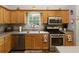 Updated kitchen featuring stainless steel appliances and ample cabinet space at 175 Prince Ct, Hiram, GA 30141