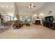 Spacious living room with a fireplace, vaulted ceilings, and neutral carpeting at 175 Prince Ct, Hiram, GA 30141