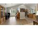 Open-concept living area with a dining area, vaulted ceilings and large windows for natural light at 175 Prince Ct, Hiram, GA 30141