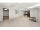 Finished basement featuring light tile flooring and an open doorway to another finished area at 410 Glenmont Ct, Atlanta, GA 30350