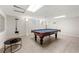 Finished basement with a pool table and accessories providing entertainment space at 410 Glenmont Ct, Atlanta, GA 30350