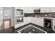 Modern kitchen features white cabinets, stainless steel appliances, and granite countertops at 410 Glenmont Ct, Atlanta, GA 30350