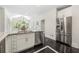 Open kitchen with stainless steel appliances, granite countertops and breakfast nook at 410 Glenmont Ct, Atlanta, GA 30350