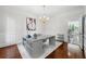 Well-lit office space offers hardwood floors, white trim, and modern furnishings at 410 Glenmont Ct, Atlanta, GA 30350