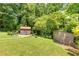Backyard with gazebo, storage shed and mature trees, perfect for outdoor enjoyment at 701 Rosedale Se Dr, Smyrna, GA 30082