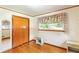 Bedroom with hardwood floors, closet, and large windows offering a bright space at 701 Rosedale Se Dr, Smyrna, GA 30082