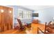 Cozy living room with hardwood floors, shuttered windows, and blue walls at 701 Rosedale Se Dr, Smyrna, GA 30082