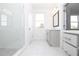 Bright and modern bathroom featuring a glass shower, vanity, and ample natural light at 816 Dodd S Trl # 172, Buford, GA 30518