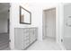 Elegant bathroom vanity with a large mirror, offering plenty of storage and modern fixtures at 816 Dodd S Trl # 172, Buford, GA 30518