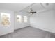 Bright bedroom featuring large windows, offering ample natural light and treetop views at 816 Dodd S Trl # 172, Buford, GA 30518