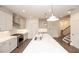 Modern kitchen design with stainless steel appliances, large island, and custom cabinetry at 816 Dodd S Trl # 172, Buford, GA 30518