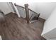 Stylish staircase with wood treads and iron railing, showcasing modern design at 816 Dodd S Trl # 172, Buford, GA 30518