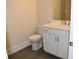 Bathroom featuring a toilet, vanity with cabinets, and tile floor at 1619 Tielman Way, Snellville, GA 30078