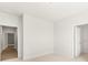 Bedroom with neutral carpet leading to a walk-in closet at 1619 Tielman Way, Snellville, GA 30078