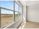 Well-lit room with a large window, wood floors and bright interior at 1619 Tielman Way, Snellville, GA 30078