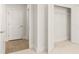 Bright bedroom with neutral carpet and walls, with hallway and closet access at 1619 Tielman Way, Snellville, GA 30078